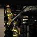 Ann Arbor firefighters inspect one of the bays at Broadway Auto Care after a fire broke out on Monday night. Melanie Maxwell I AnnArbor.com